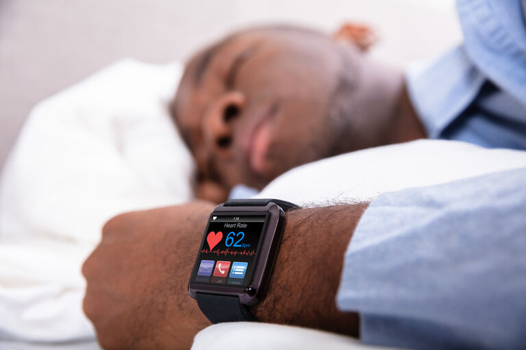 man sleeping with watch